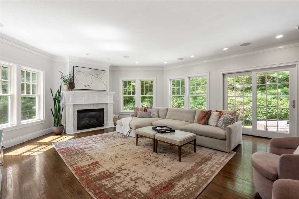5 Beard Way Wellesley, MA 02482 - Photo 8 of 36 a living room with furniture and a fireplace
