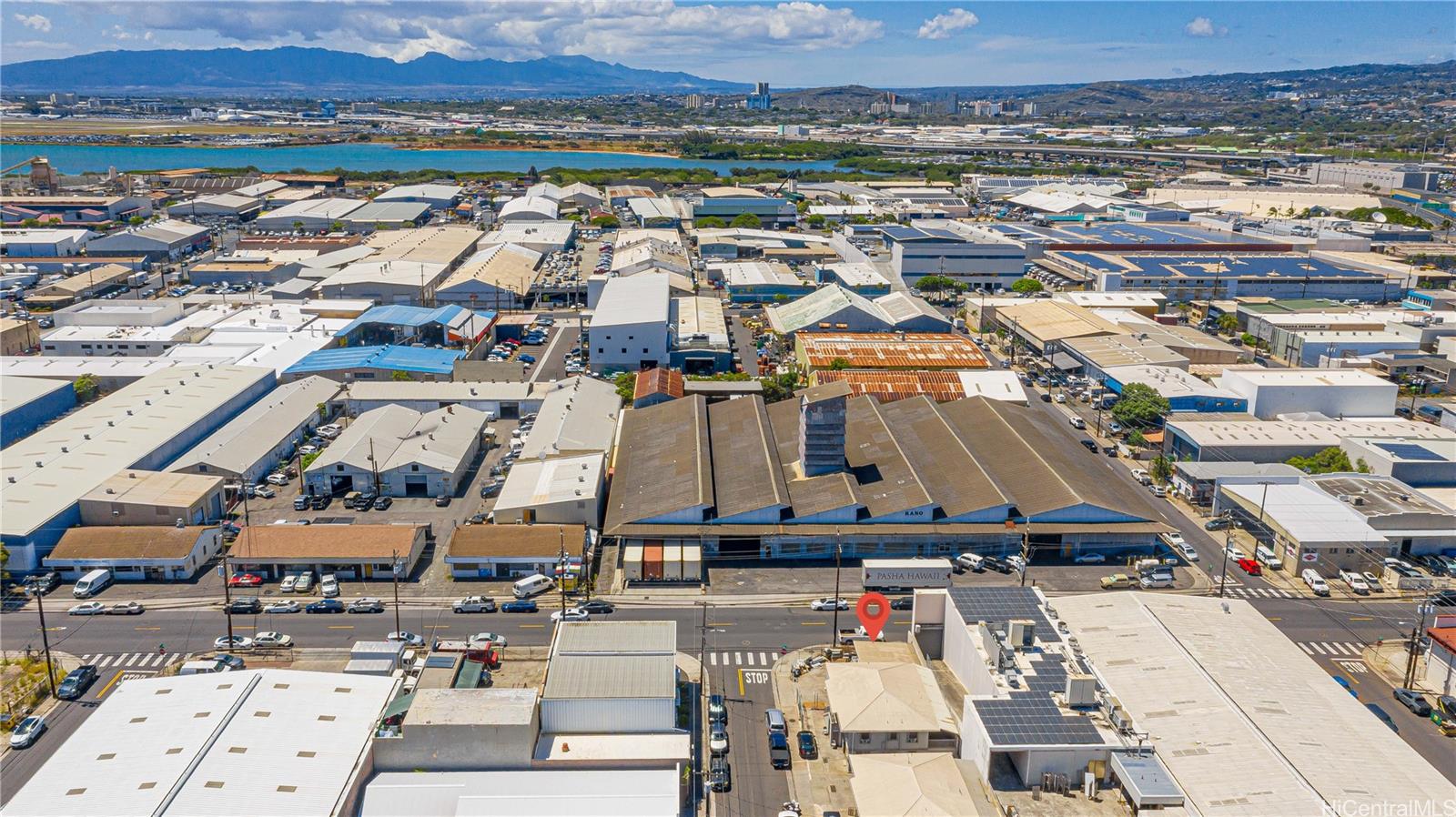 1768 Silva Street Honolulu, HI 96819 - Photo 17 of 22 an aerial view of a building with parking and city view