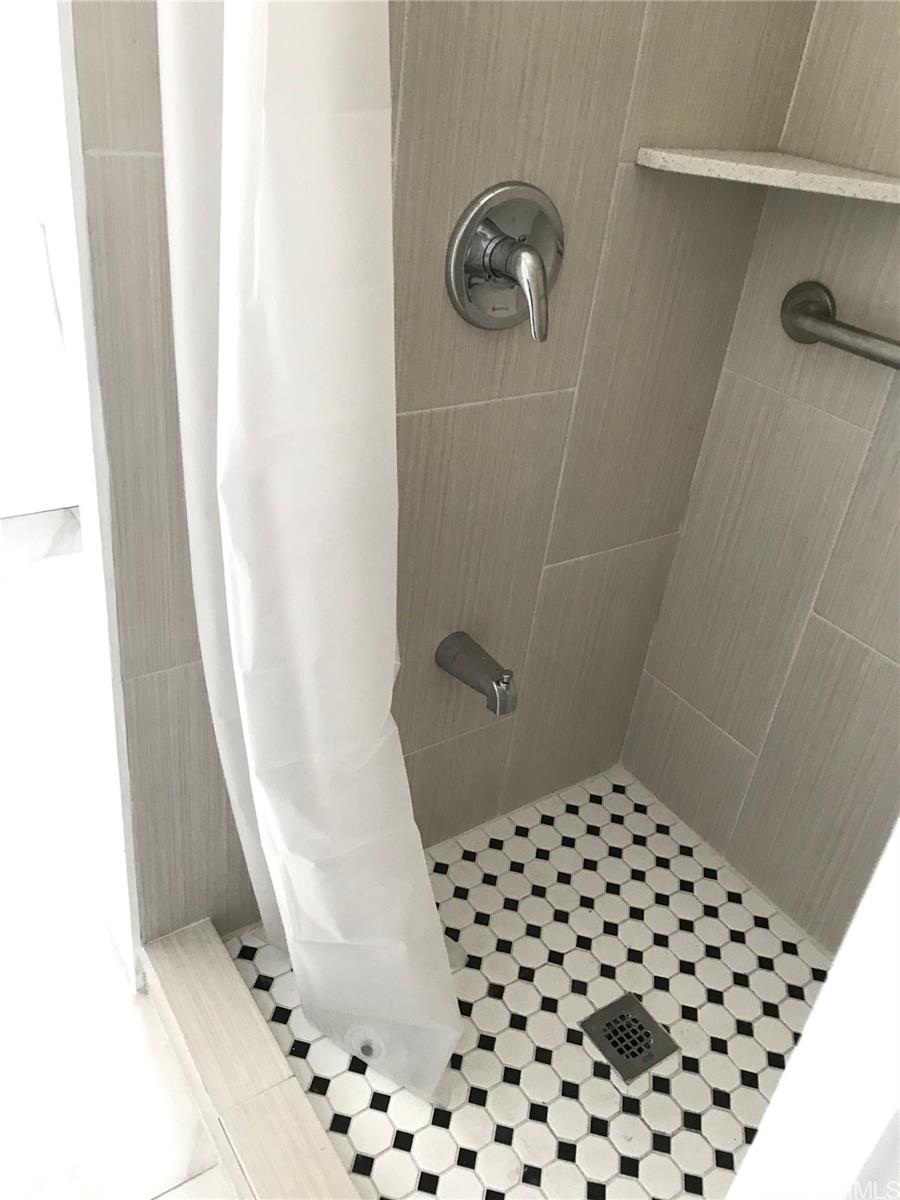 1768 Silva Street Honolulu, HI 96819 - Photo 21 of 22 a bathroom with a shower