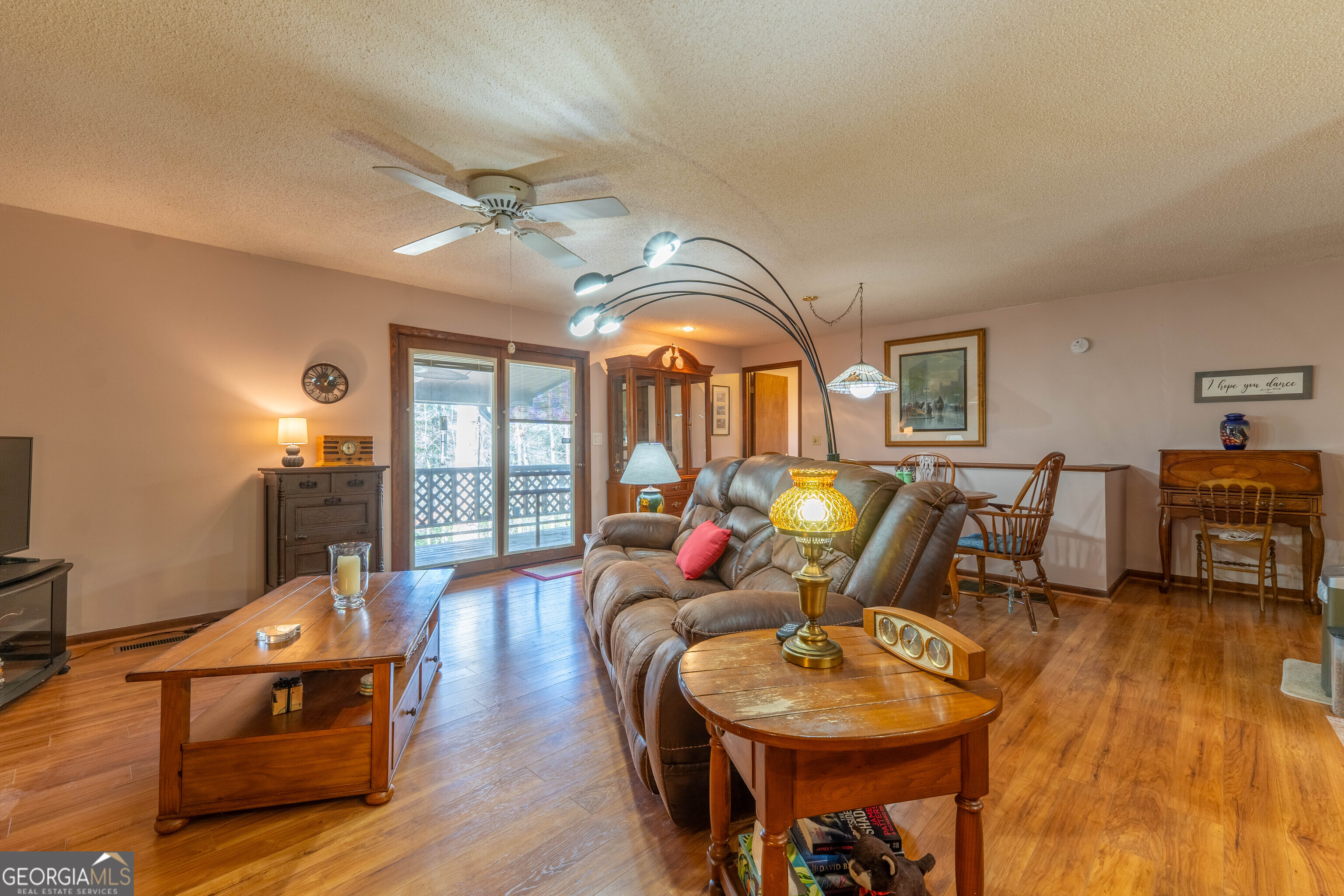 300 Sandy Gap Road Murphy, NC 28906 - Photo 17 of 48 a living room with furniture and wooden floor