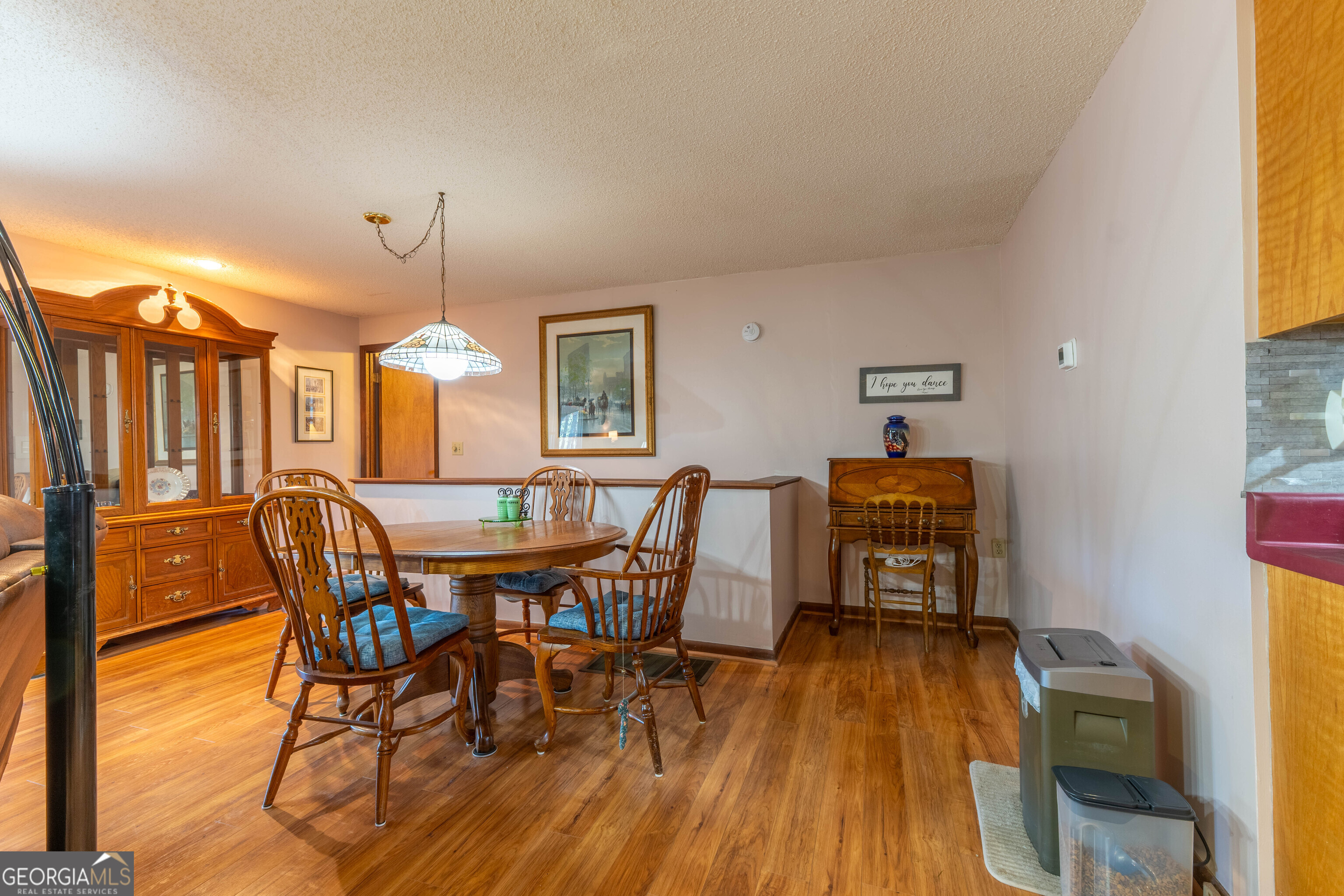 300 Sandy Gap Road Murphy, NC 28906 - Photo 25 of 48 a view of a dining room with furniture and wooden floor