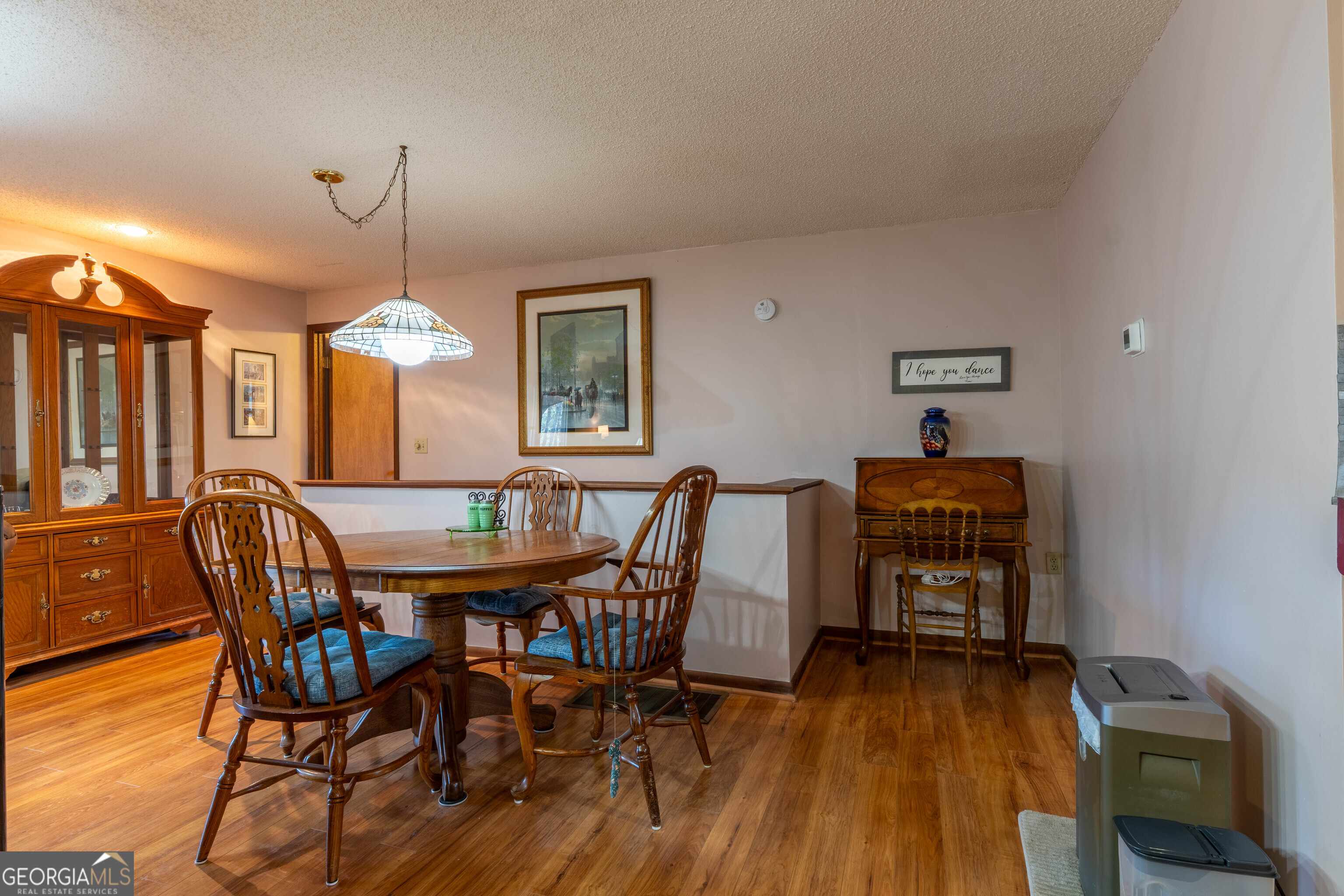 300 Sandy Gap Road Murphy, NC 28906 - Photo 26 of 48 a view of a dining room with furniture and wooden floor