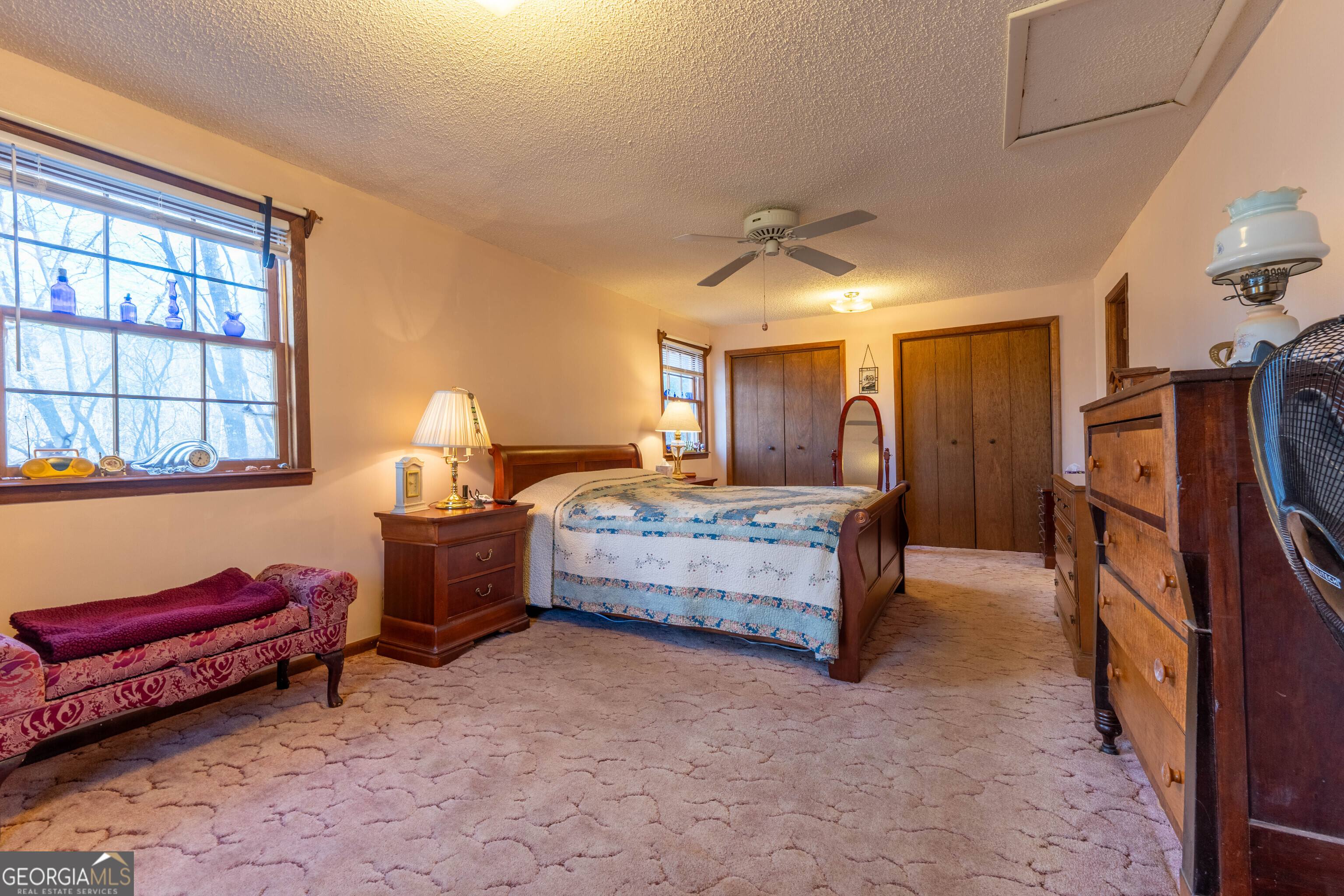 300 Sandy Gap Road Murphy, NC 28906 - Photo 28 of 48 a bedroom with furniture and a window