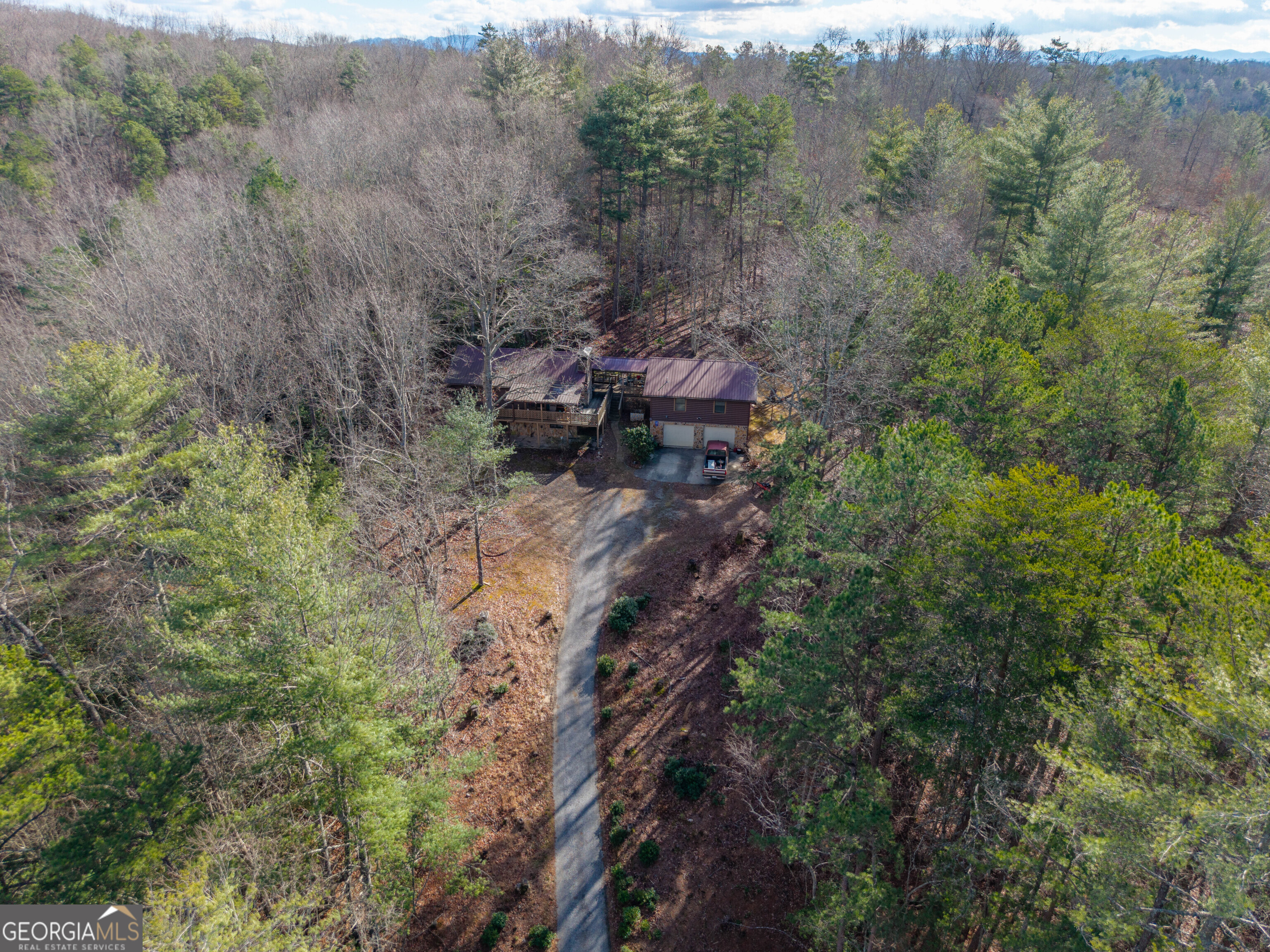300 Sandy Gap Road Murphy, NC 28906 - Photo 5 of 48 a backyard of a house with lots of green space