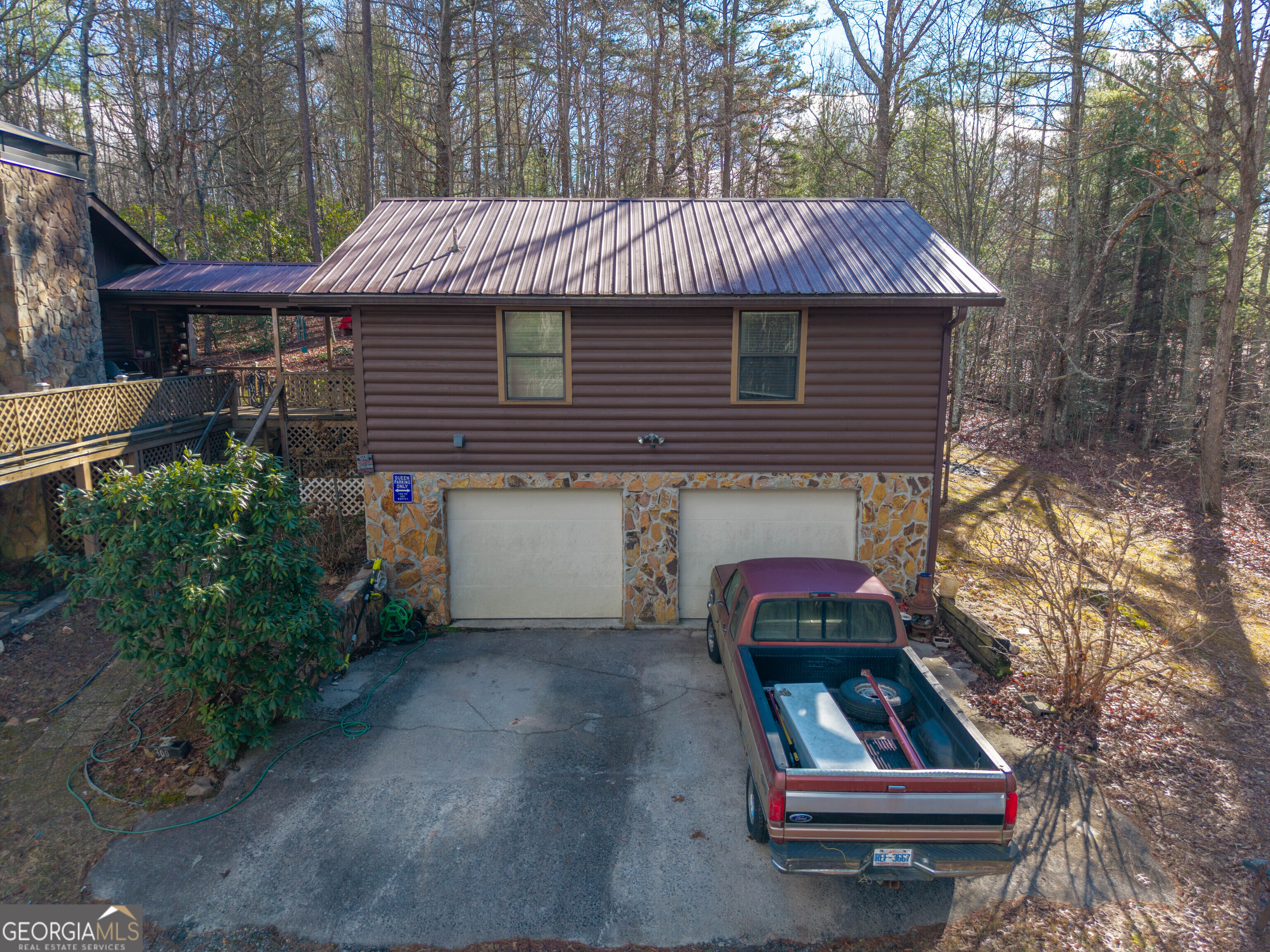 300 Sandy Gap Road Murphy, NC 28906 - Photo 10 of 48 a front view of a house with yard and trees