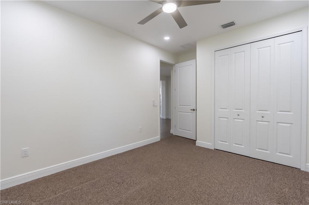 3549 Canopy Circle Naples, FL 34120 - Photo 22 of 50 a view of an empty room