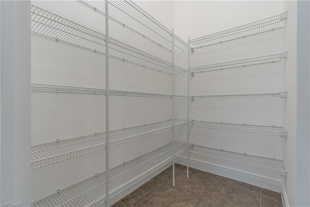3549 Canopy Circle Naples, FL 34120 - Photo 30 of 50 a view of an empty walk in closet