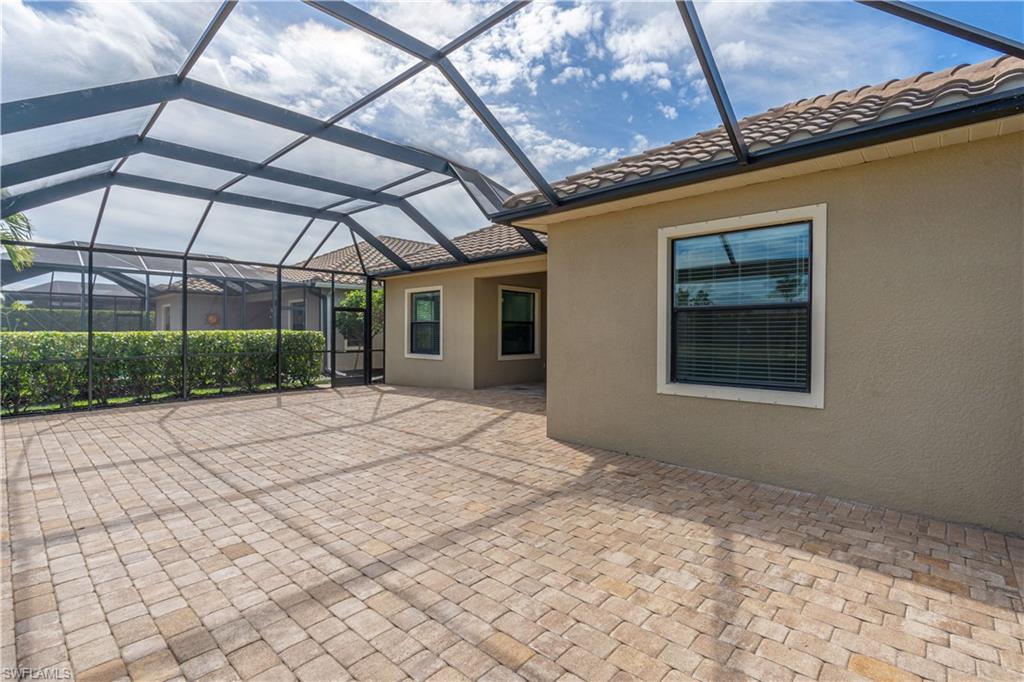 3549 Canopy Circle Naples, FL 34120 - Photo 39 of 50 a view of a backyard of a house