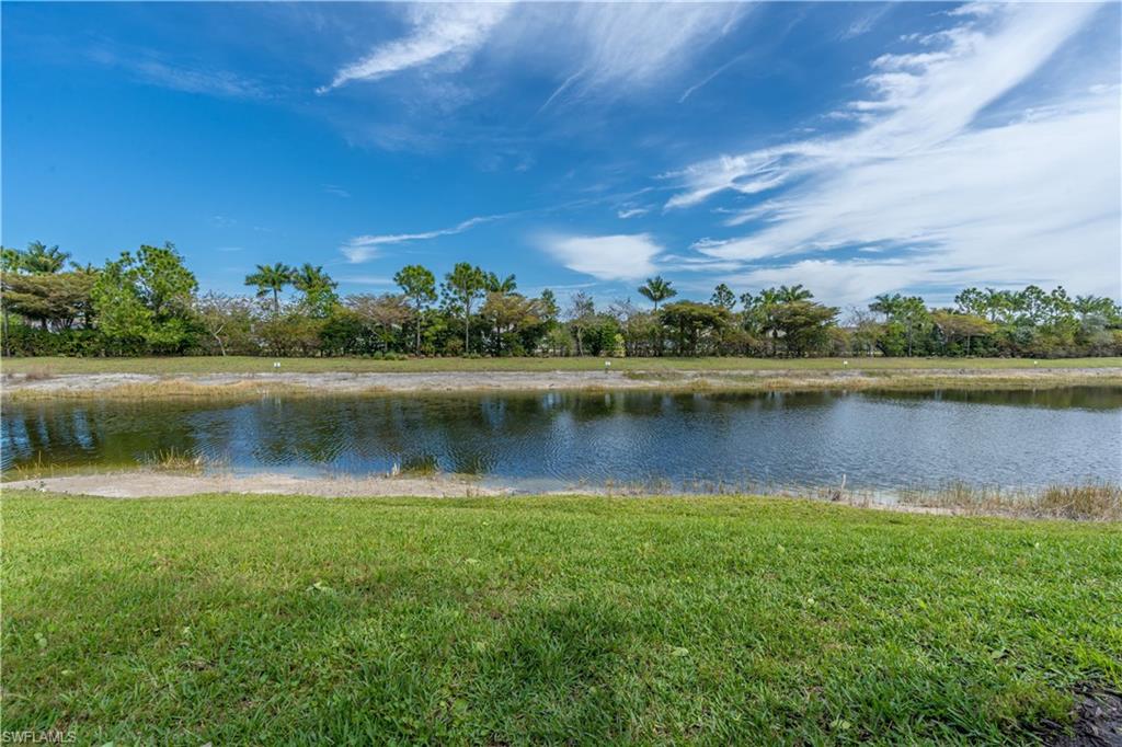 3549 Canopy Circle Naples, FL 34120 - Photo 43 of 50 a view of a lake with a city view