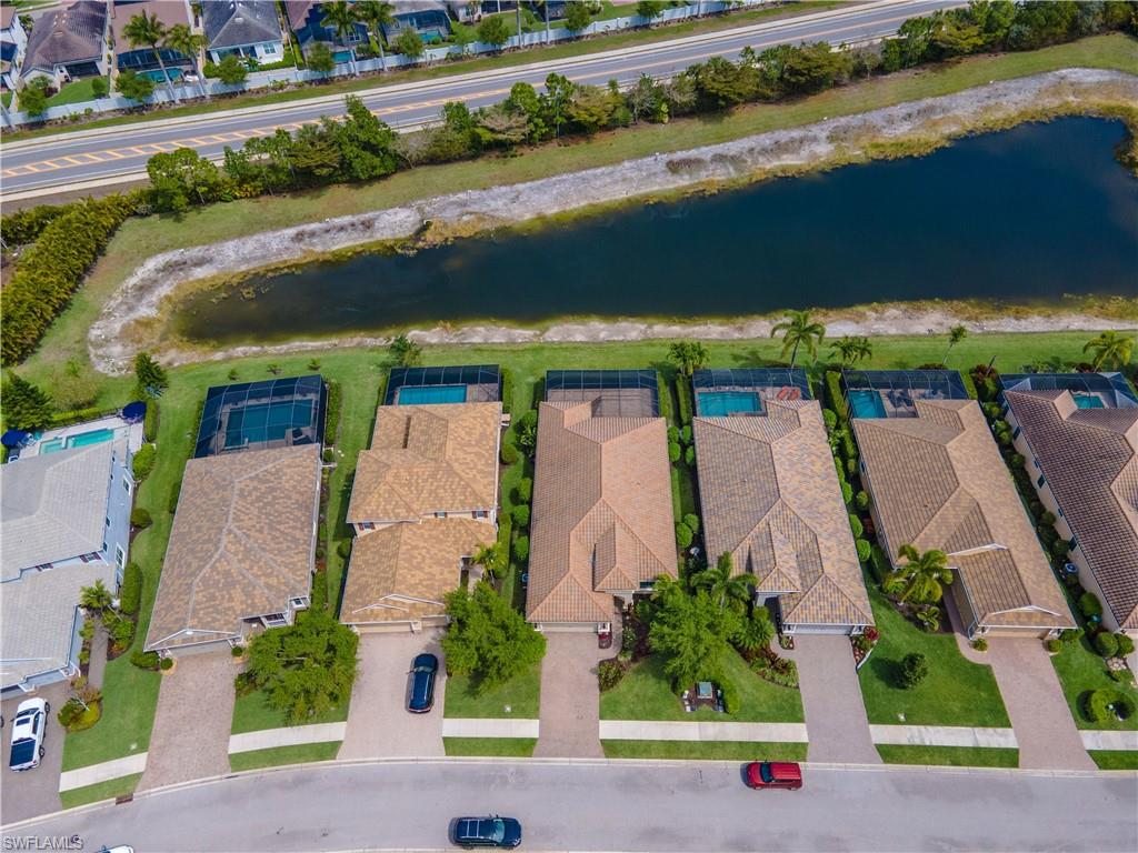 3549 Canopy Circle Naples, FL 34120 - Photo 46 of 50 an aerial view of multiple house