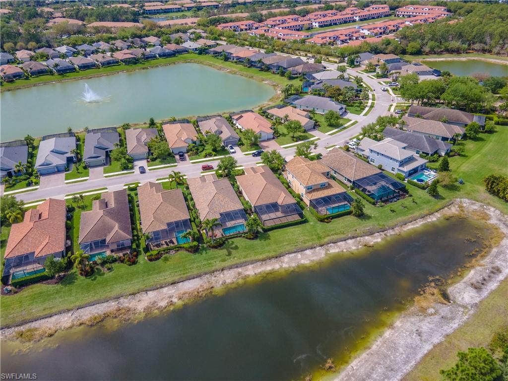 3549 Canopy Circle Naples, FL 34120 - Photo 50 of 50 an aerial view of residential houses with outdoor space and lake view
