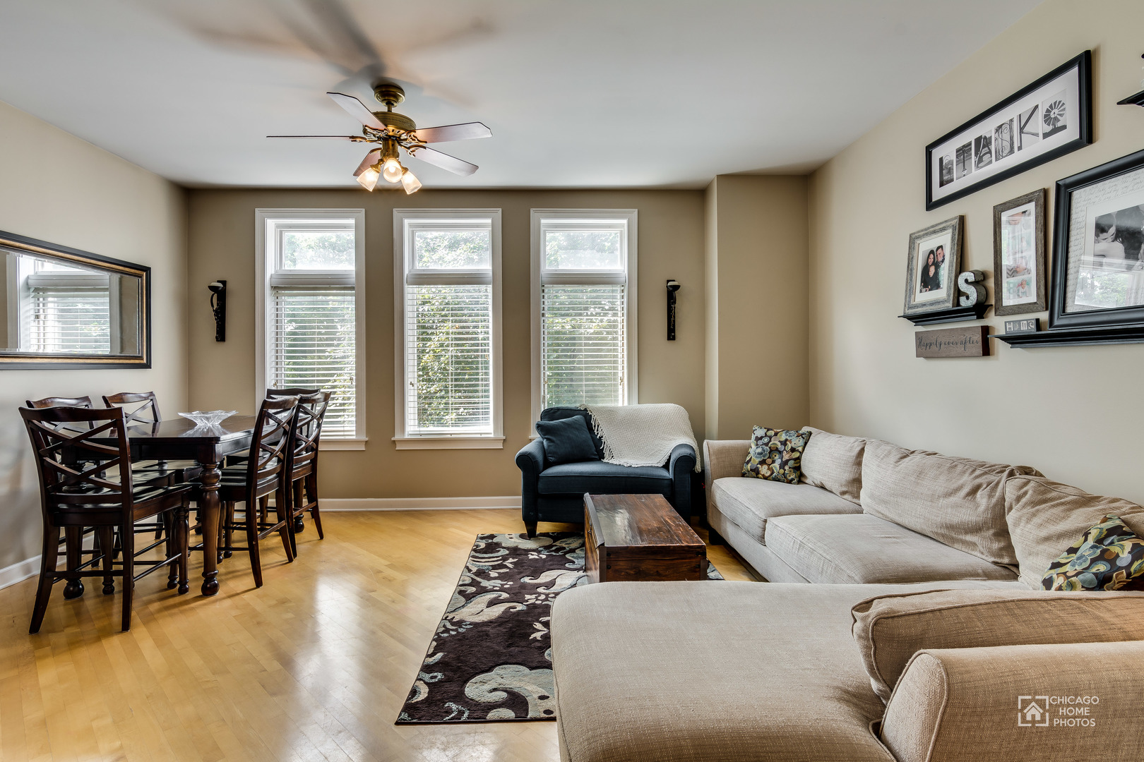 2128 West Walton Street, Unit 2E Chicago, IL 60622 - Photo 2 of 23 a living room with furniture and a large window