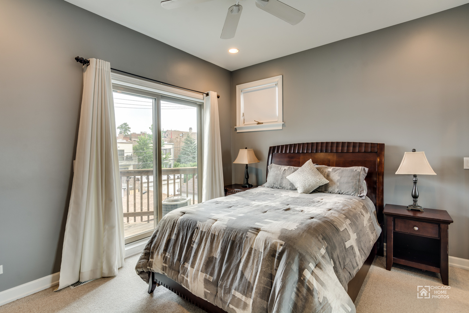 2128 West Walton Street, Unit 2E Chicago, IL 60622 - Photo 11 of 23 a bed sitting in a bedroom next to a window