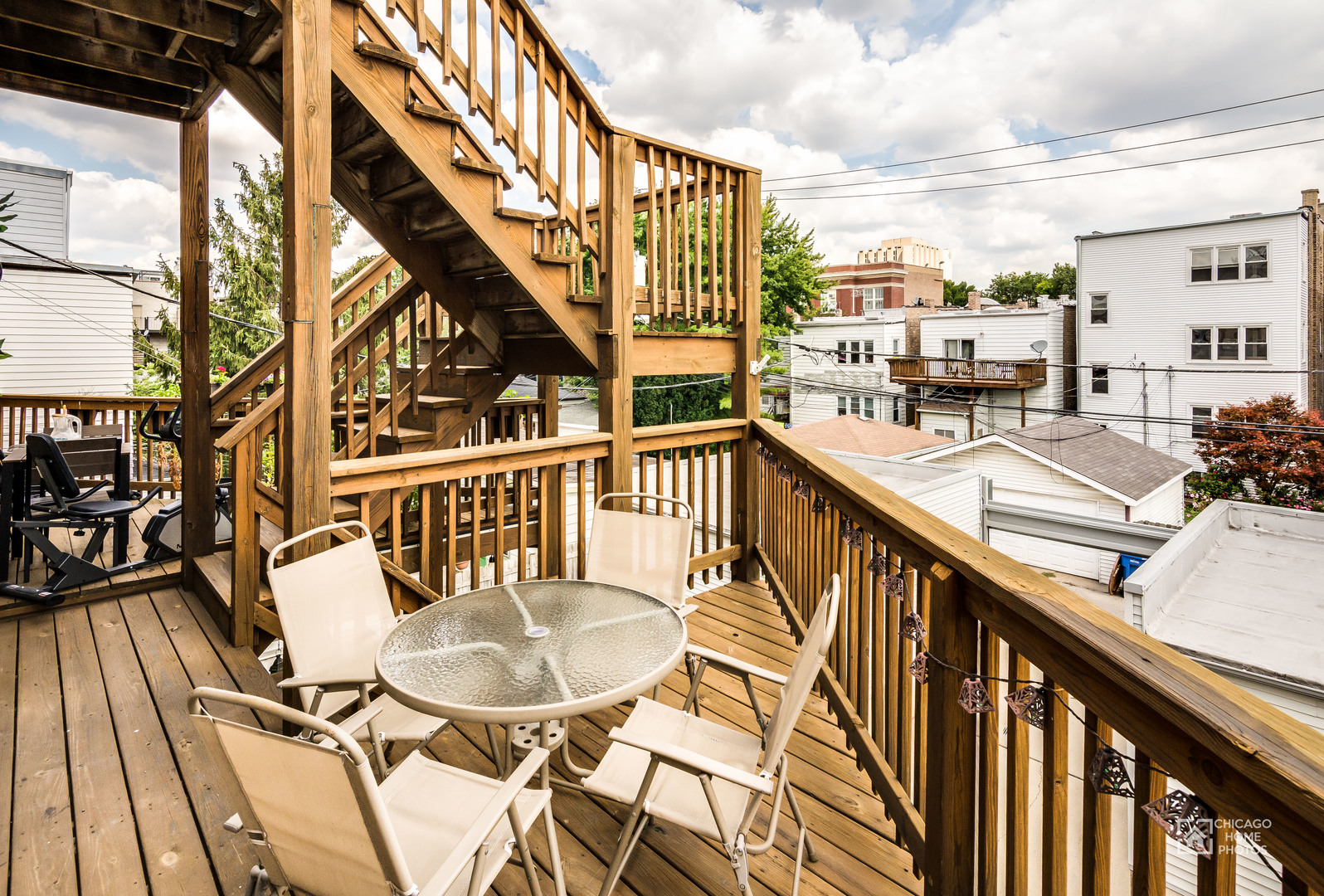 2128 West Walton Street, Unit 2E Chicago, IL 60622 - Photo 21 of 23 a balcony with table and chairs
