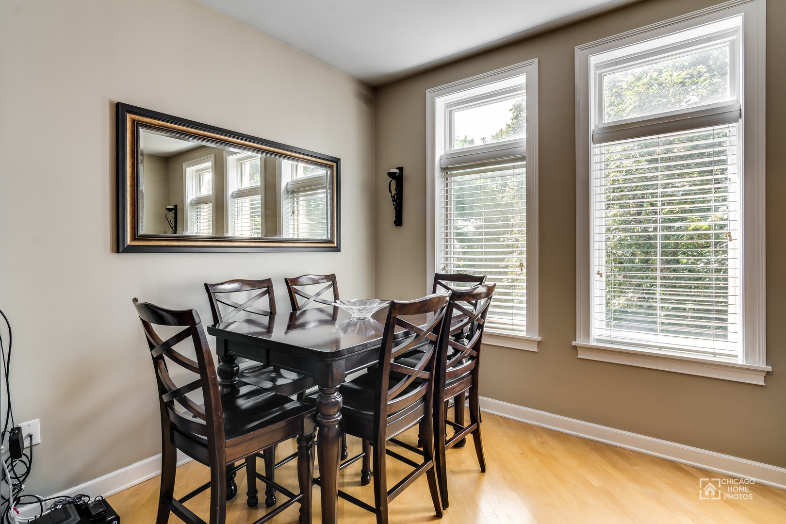 2128 West Walton Street, Unit 2E Chicago, IL 60622 - Photo 4 of 23 a view of a dining room with furniture and windows
