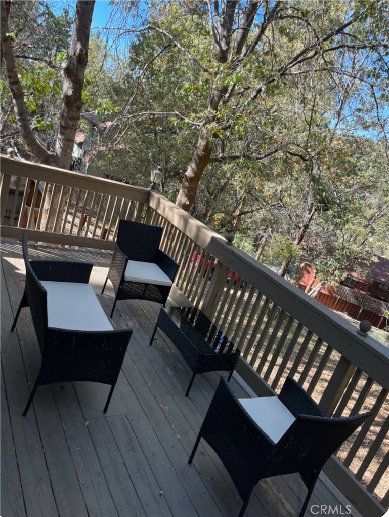 33076 Robin Lane Running Springs, CA 92382 - Photo 7 of 10 a view of a couches in the balcony