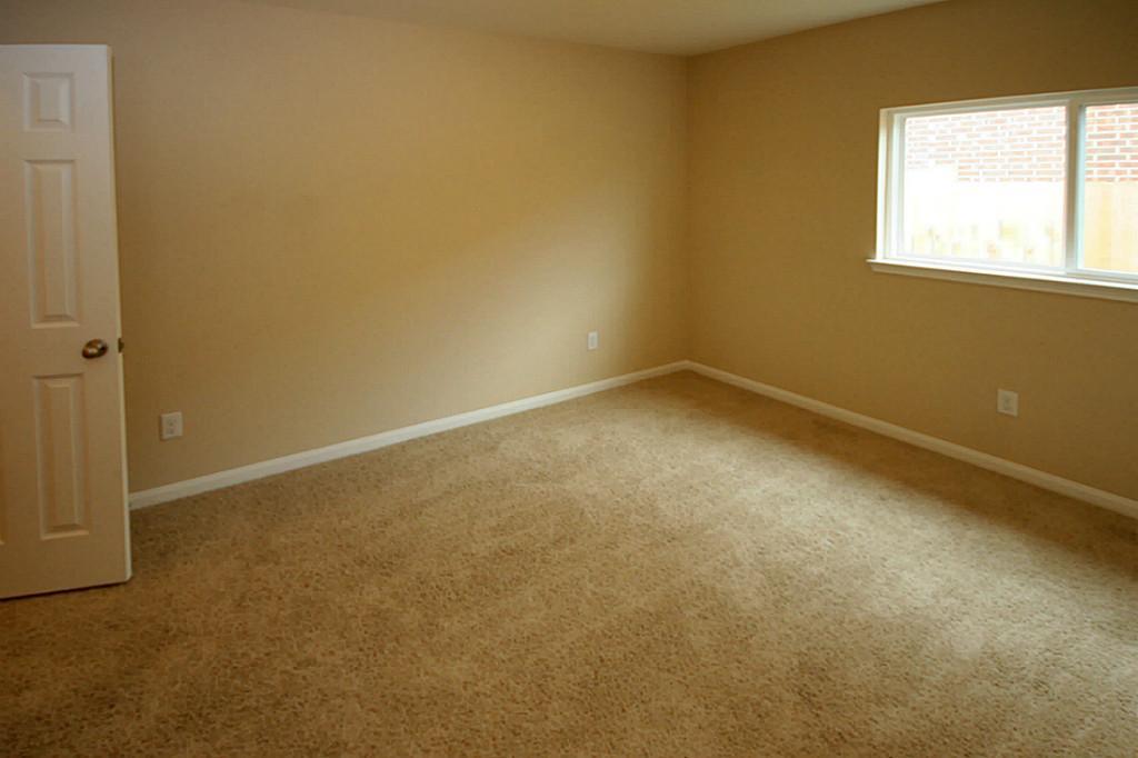 5427 Marble Ravine Richmond, TX 77407 - Photo 12 of 17 an empty room with a window