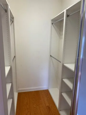 a bathroom with a glass door shower