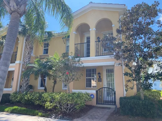 front view of a house with a garden