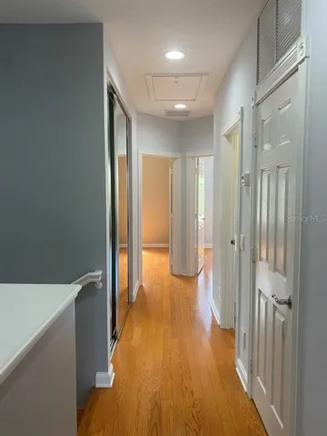 a view of entryway with wooden floor