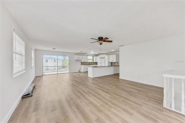 a view of a livingroom with wooden floor