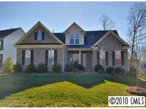 622 Panthers Way Fort Mill, SC 29708 - Photo 1 of 8 a front view of a house with garden