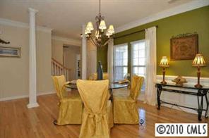 622 Panthers Way Fort Mill, SC 29708 - Photo 5 of 8 a view of a dining room with furniture and a chandelier