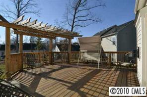 622 Panthers Way Fort Mill, SC 29708 - Photo 8 of 8 a view of a patio with a table and chairs