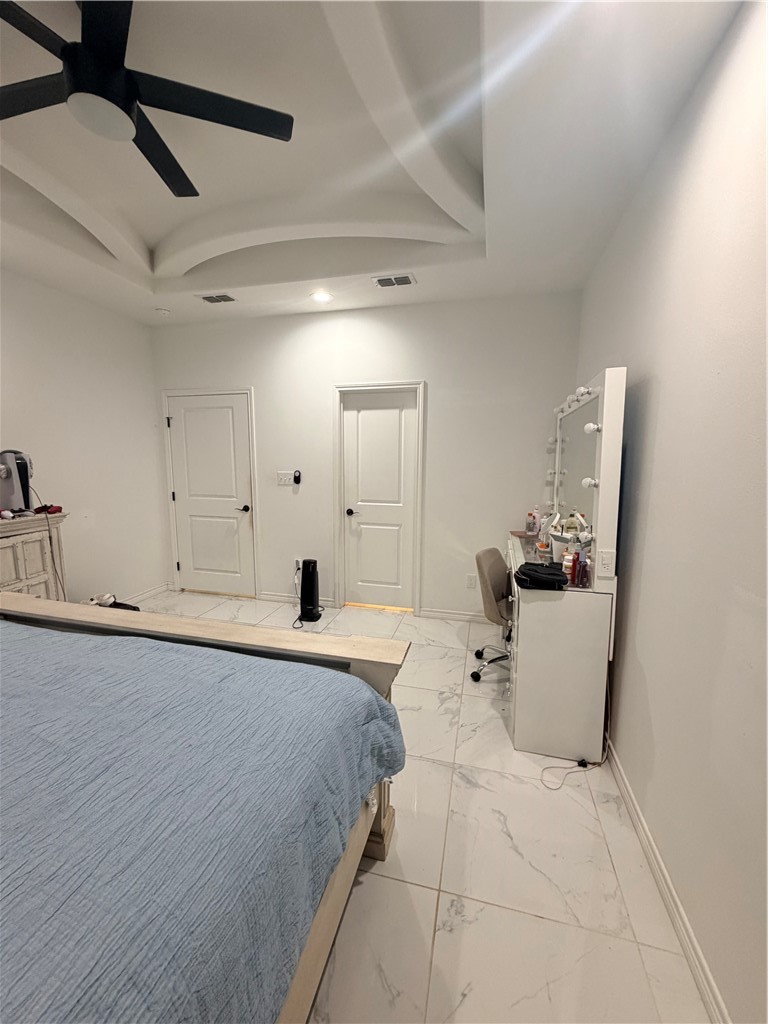 903 West Main Street Alice, TX 78332 - Photo 17 of 24 a large white bed in a white room