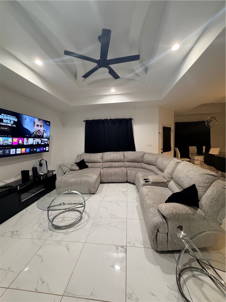903 West Main Street Alice, TX 78332 - Photo 3 of 24 a living room with furniture and a flat screen tv