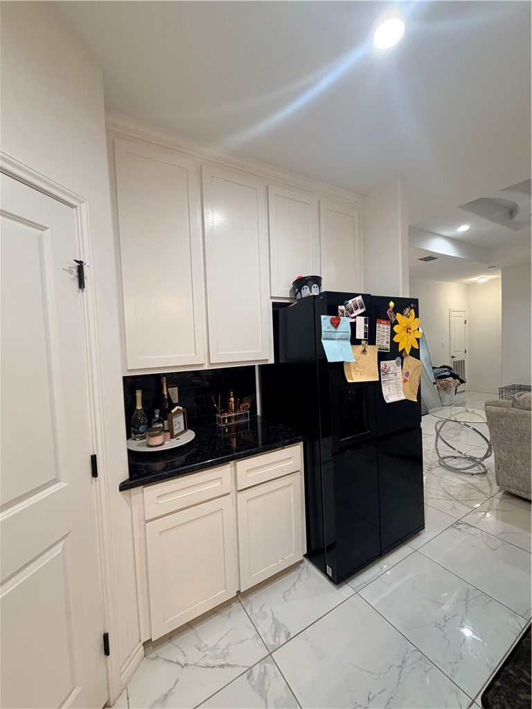 903 West Main Street Alice, TX 78332 - Photo 8 of 24 a kitchen with a sink and cabinets