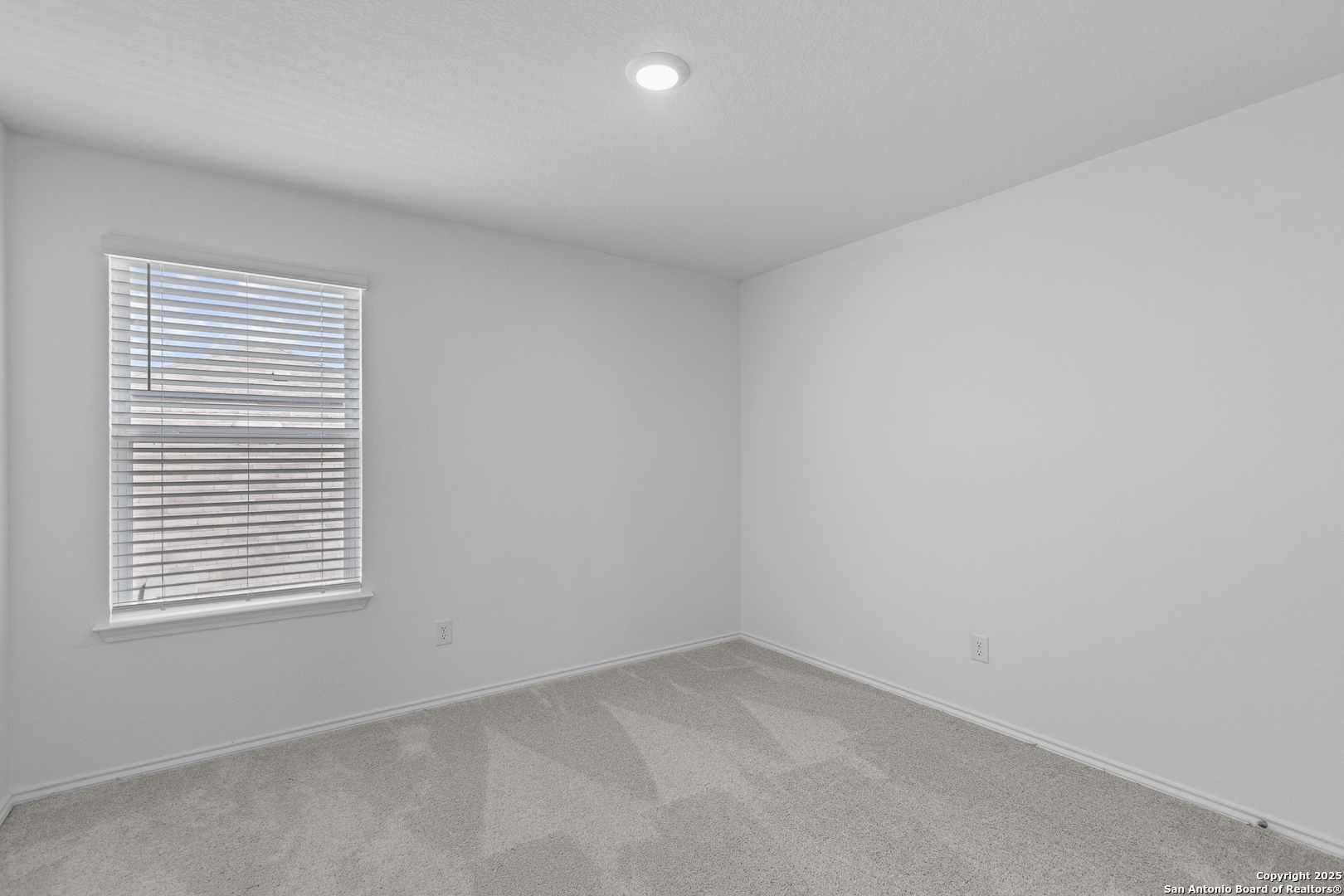 416 Raven Row Marion, TX 78124 - Photo 26 of 29 an empty room with a window