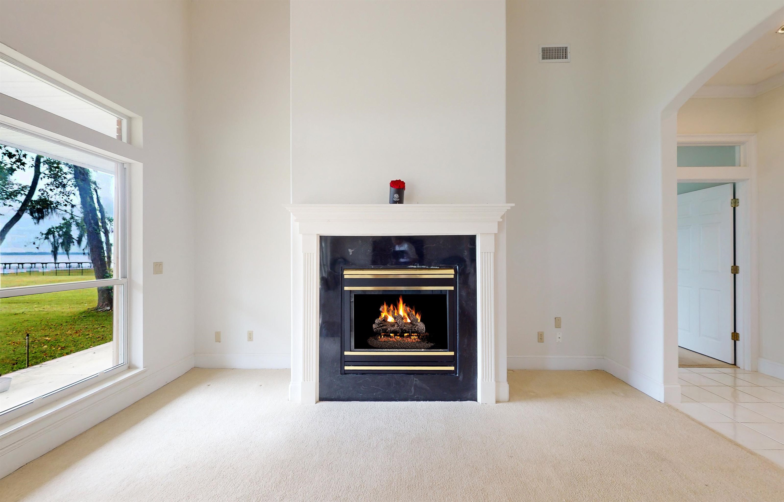 3593 Westover Road Fleming Island, FL 32003 - Photo 17 of 71 a workspace with fireplace and window