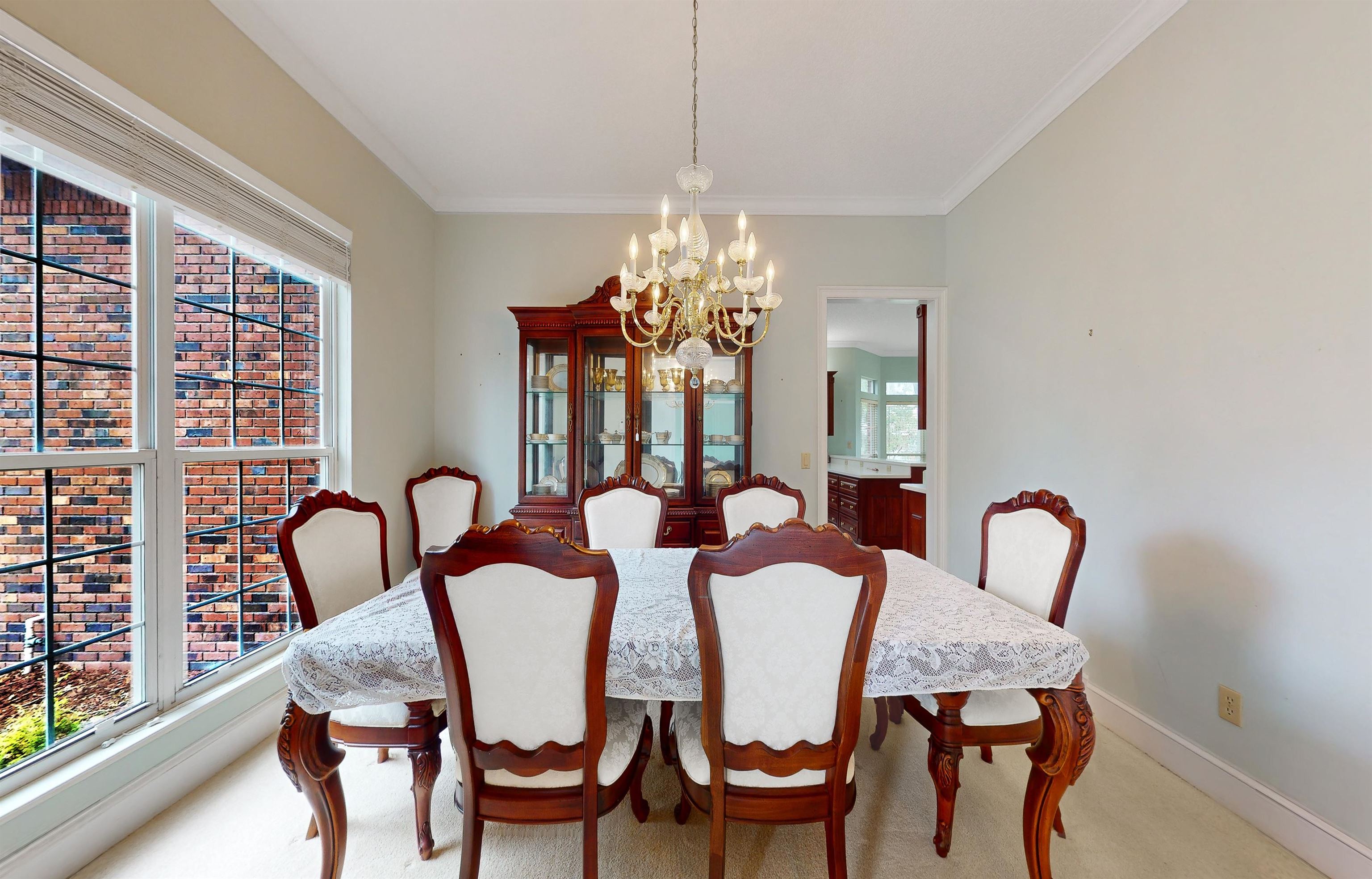 3593 Westover Road Fleming Island, FL 32003 - Photo 18 of 71 a dining room with furniture and window