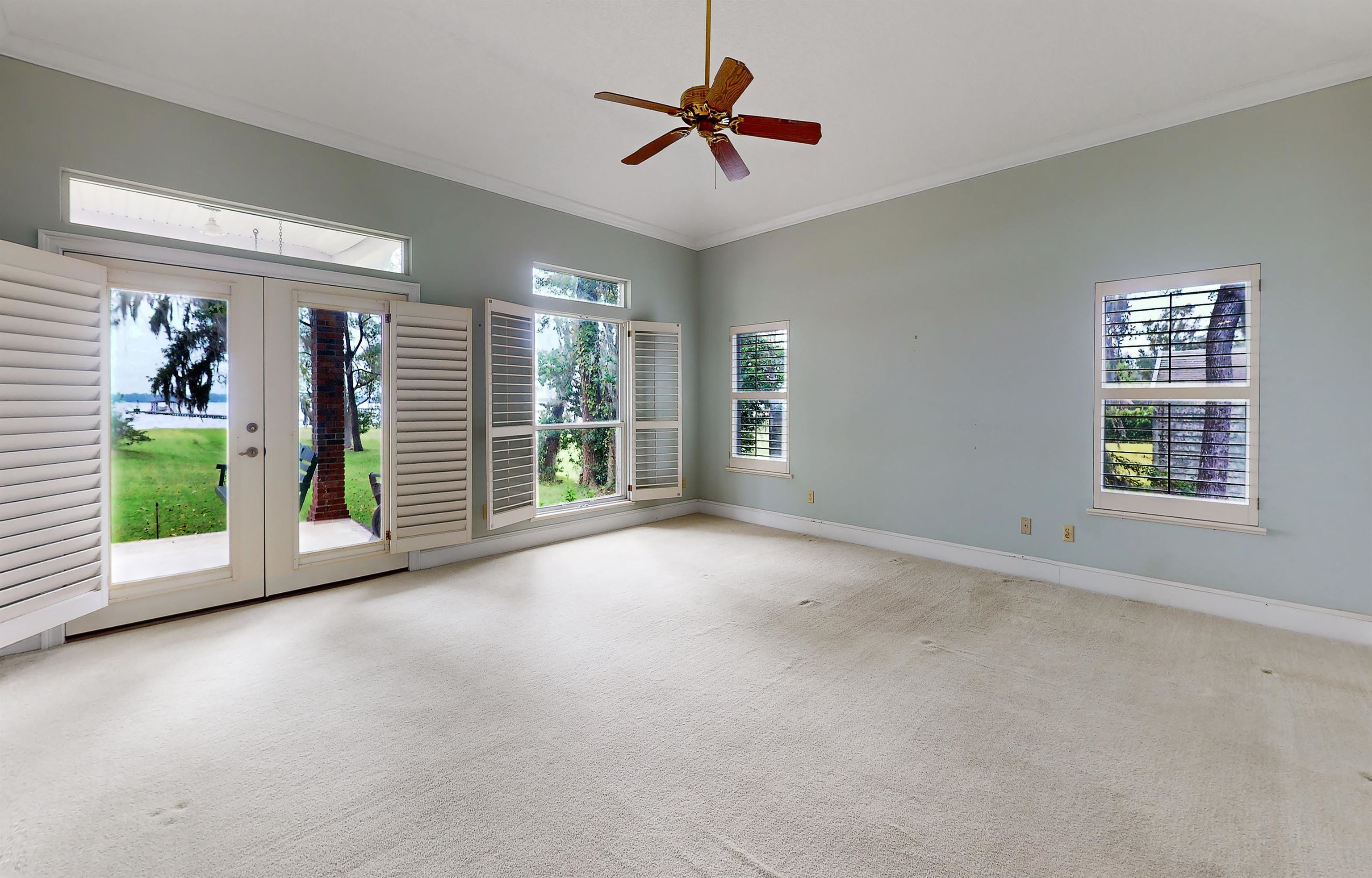 3593 Westover Road Fleming Island, FL 32003 - Photo 33 of 71 a view of a livingroom with an empty space and a fireplace