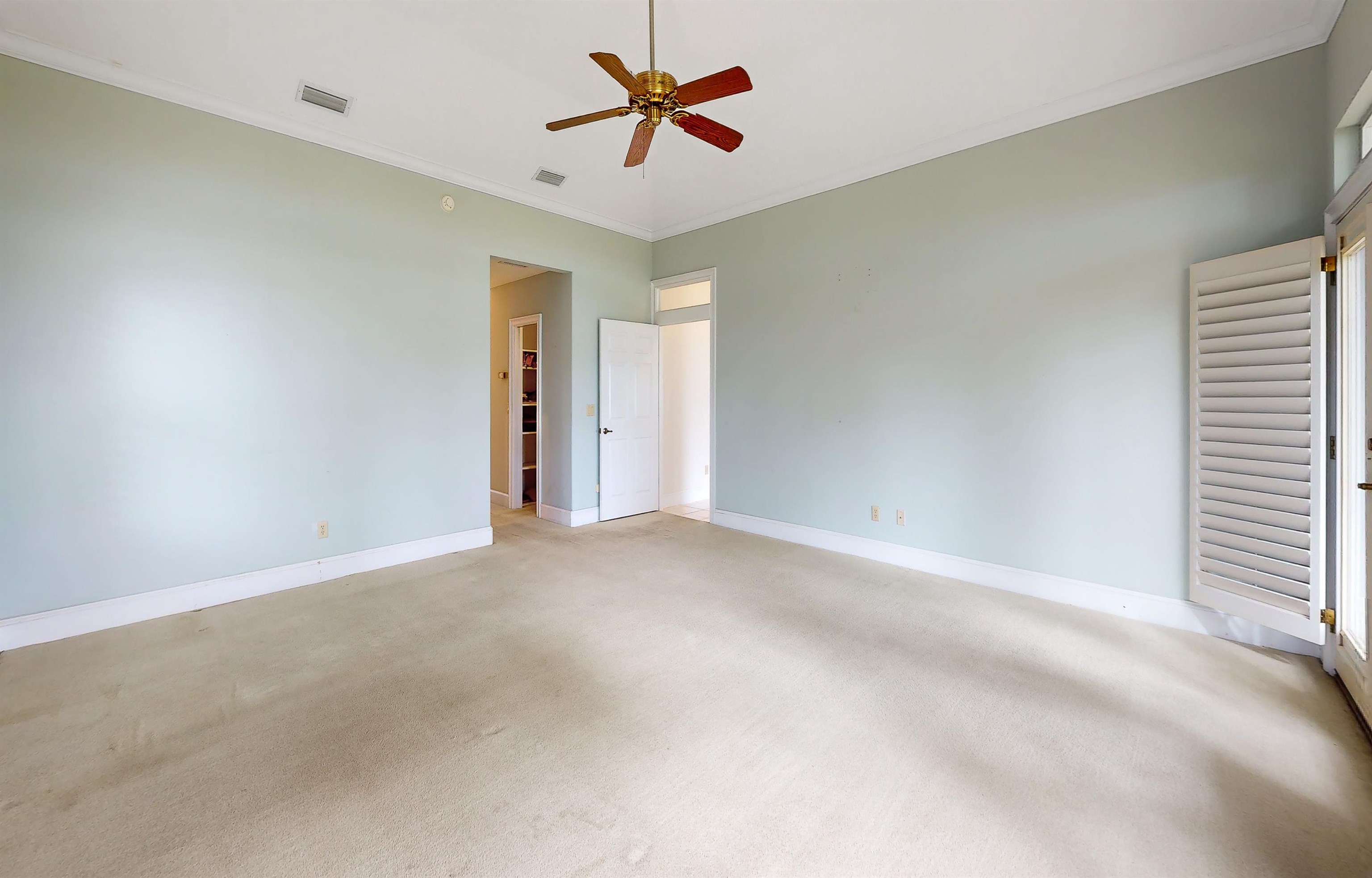 3593 Westover Road Fleming Island, FL 32003 - Photo 34 of 71 a view of a room with a ceiling fan and window