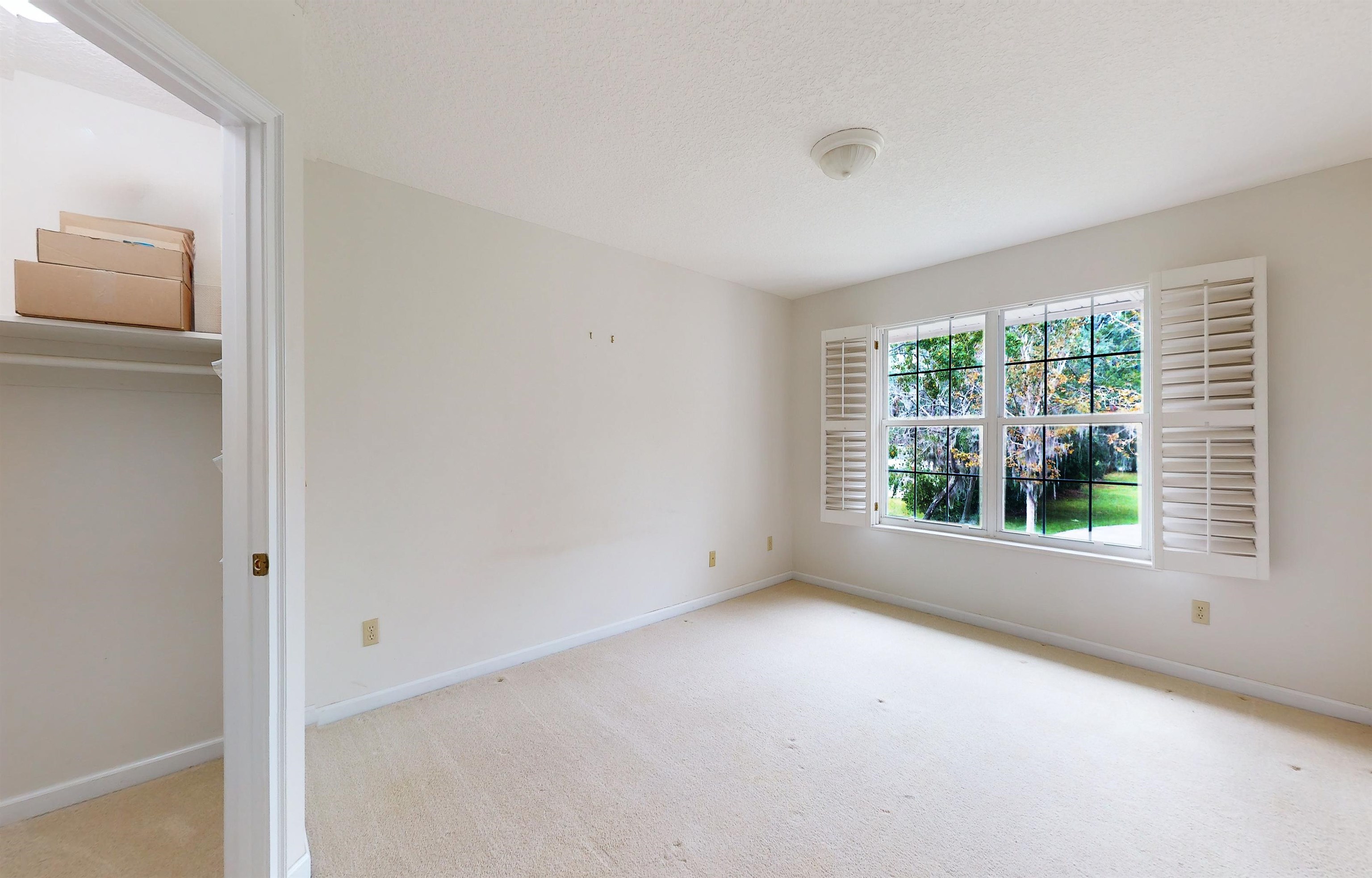 3593 Westover Road Fleming Island, FL 32003 - Photo 40 of 71 a view of an empty room with a window