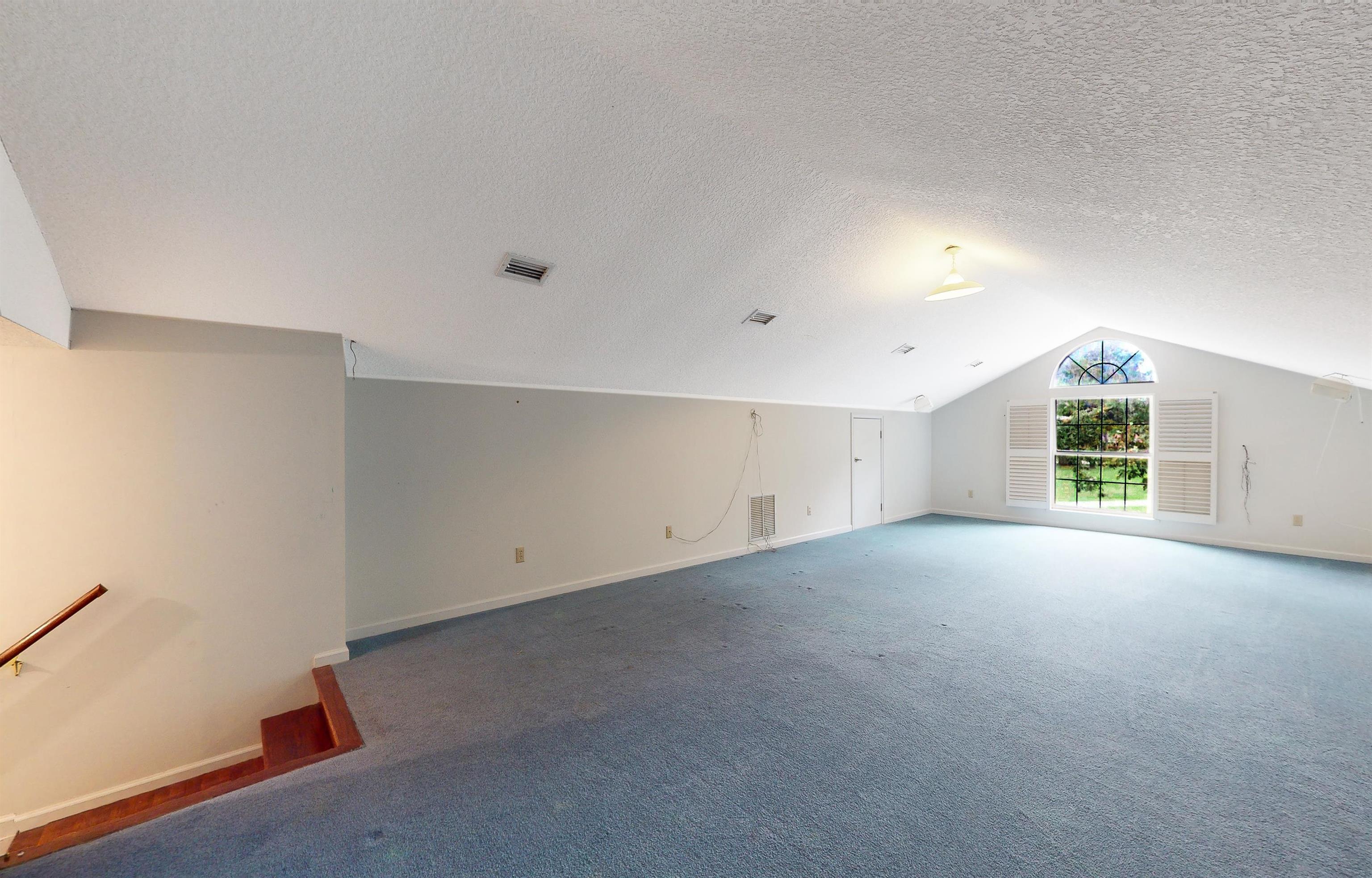 3593 Westover Road Fleming Island, FL 32003 - Photo 46 of 71 an empty room with windows