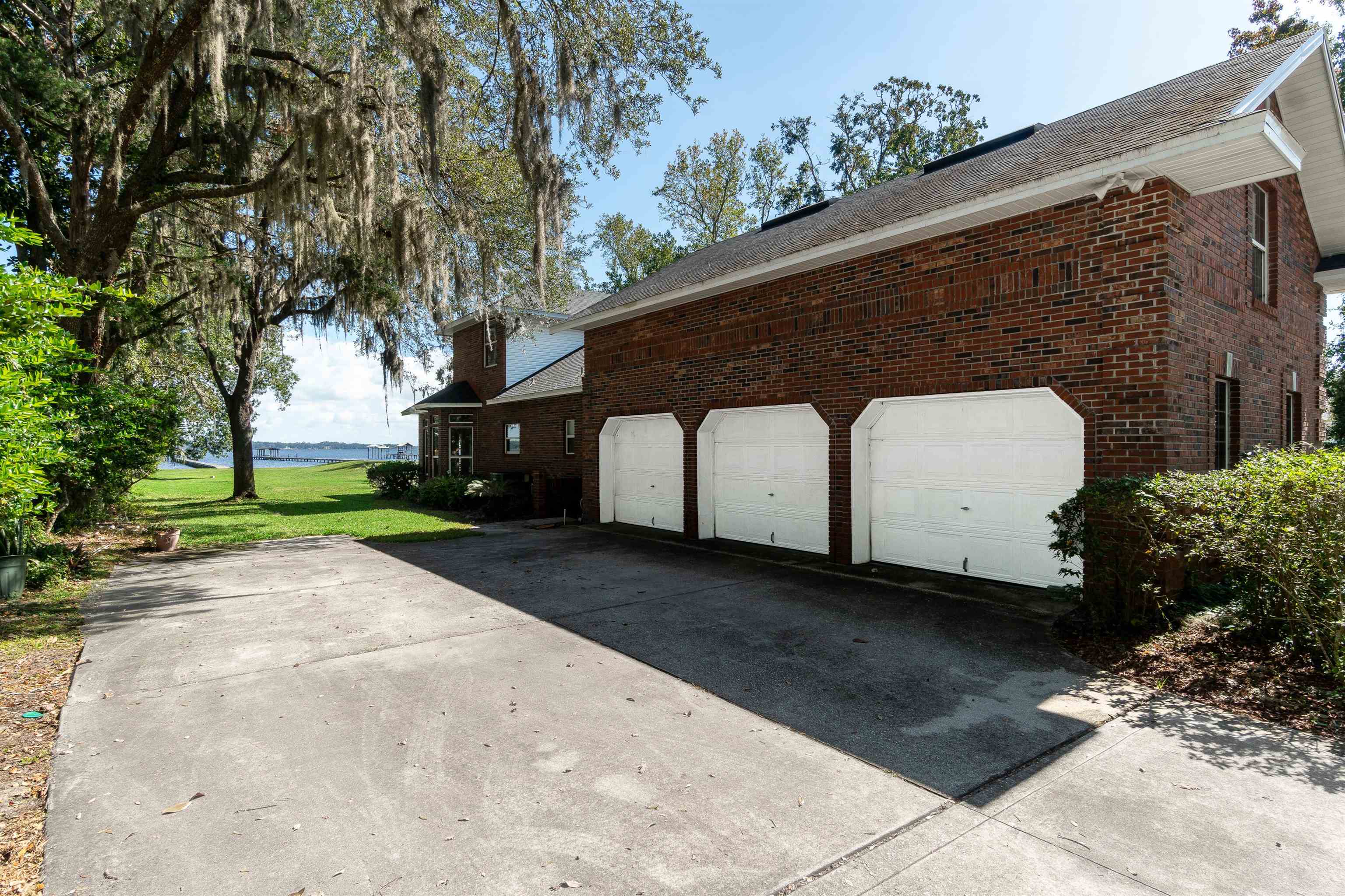 3593 Westover Road Fleming Island, FL 32003 - Photo 50 of 71 a front view of a house with a yard