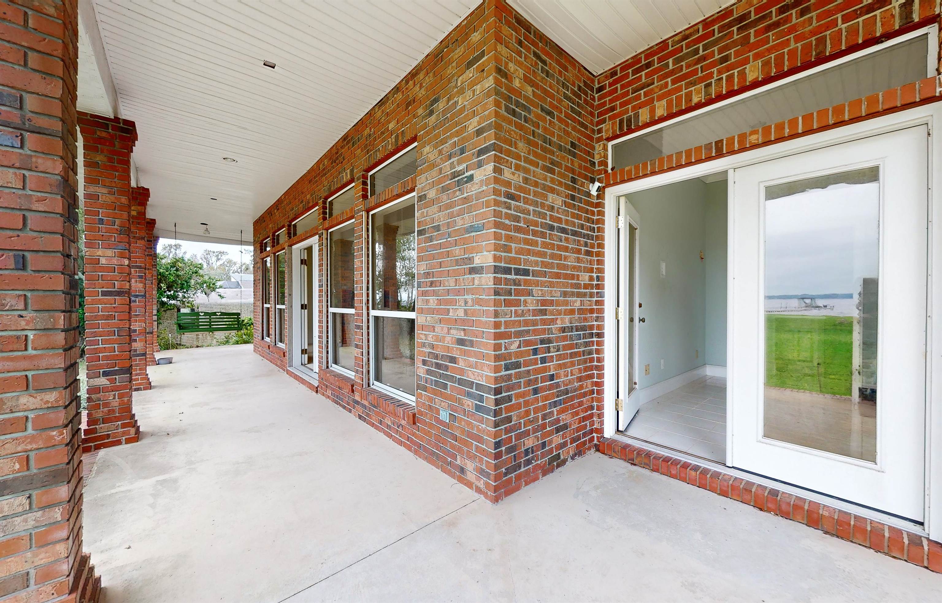 3593 Westover Road Fleming Island, FL 32003 - Photo 51 of 71 a view of a balcony with a potted plants