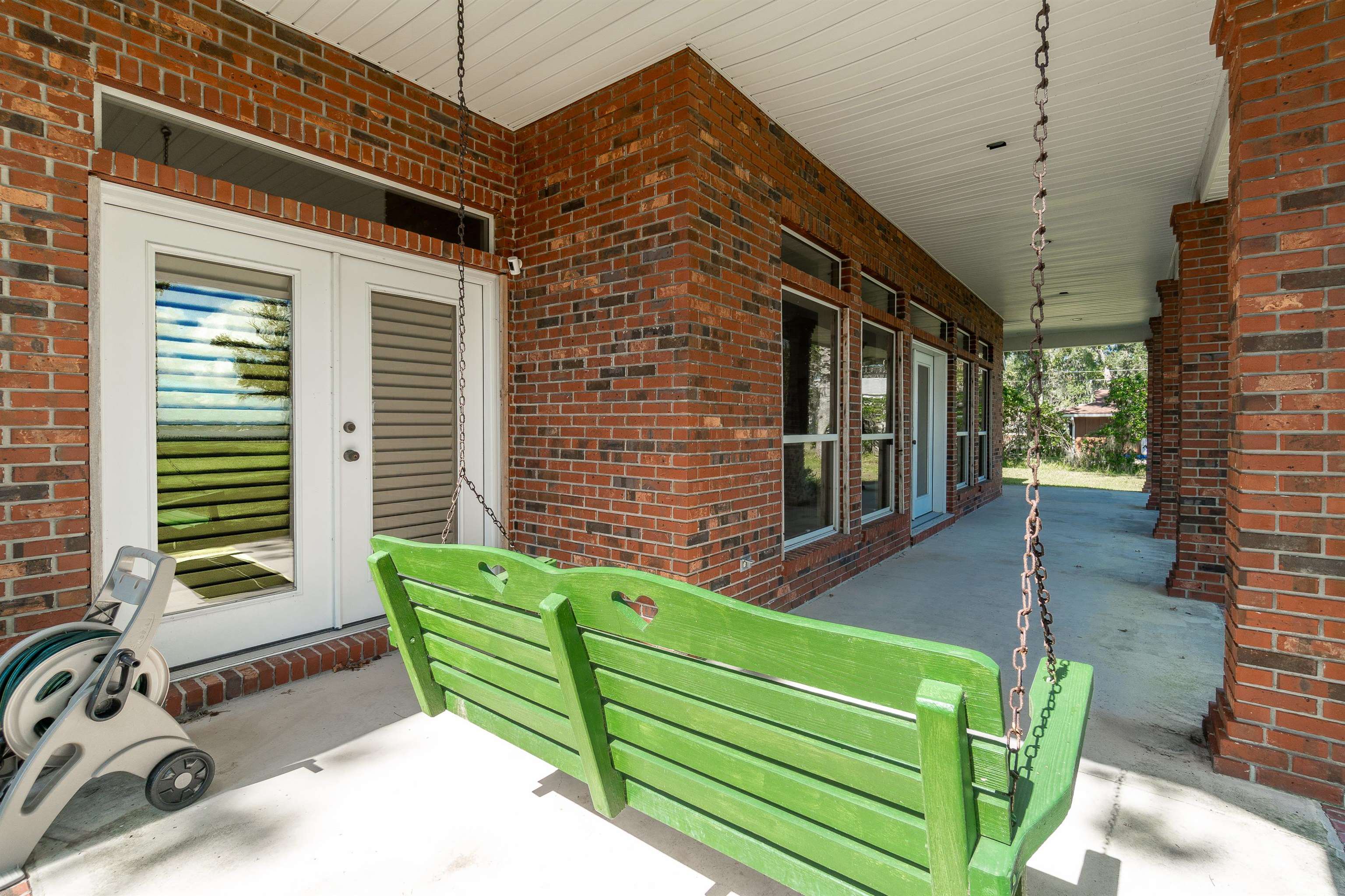 3593 Westover Road Fleming Island, FL 32003 - Photo 52 of 71 a view of a two chairs in the patio