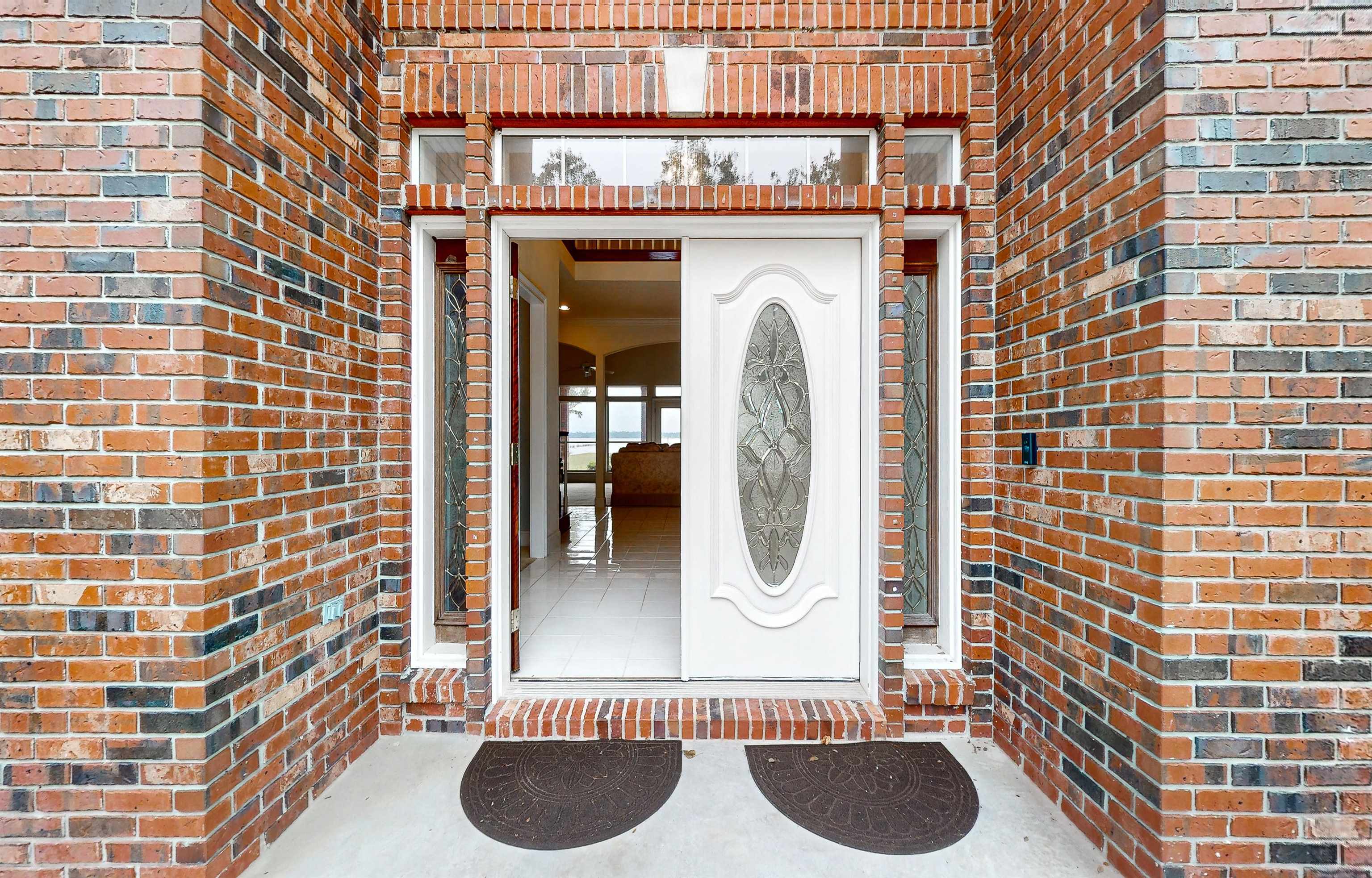 3593 Westover Road Fleming Island, FL 32003 - Photo 8 of 71 a bathroom with a sink a toilet and a shower