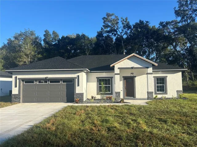 $299,900 | 2857 Southeast 142nd Lane, Summerfield, FL 34491