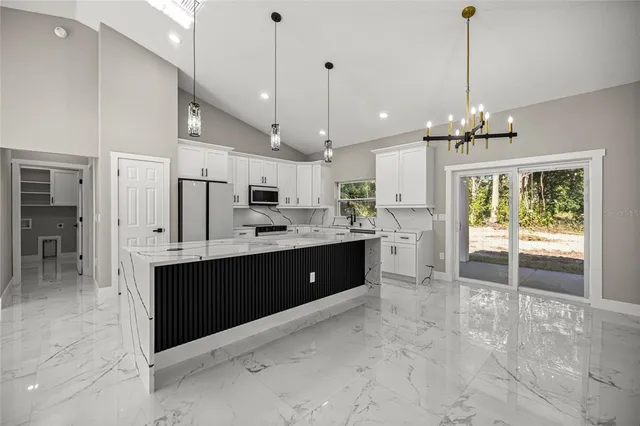 $299,900 | 2857 Southeast 142nd Lane, Summerfield, FL 34491