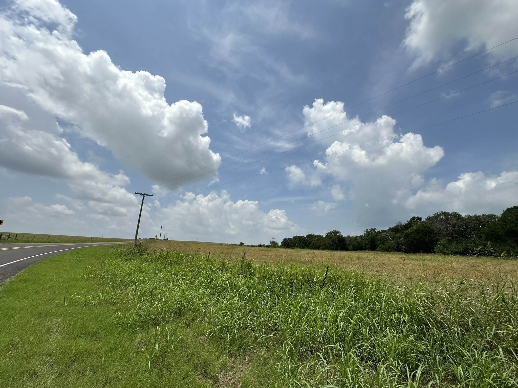 999999 East Main Street Troy, TX 76579 - Photo 13 of 20 a backyard of a house with lots of green space and lake view