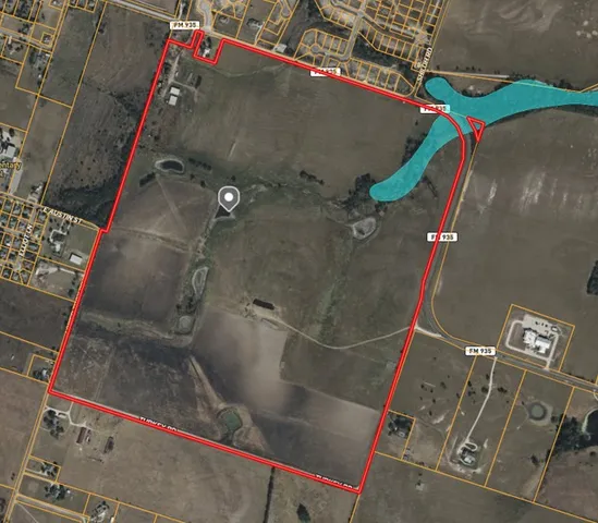 a view of an ocean and a yard