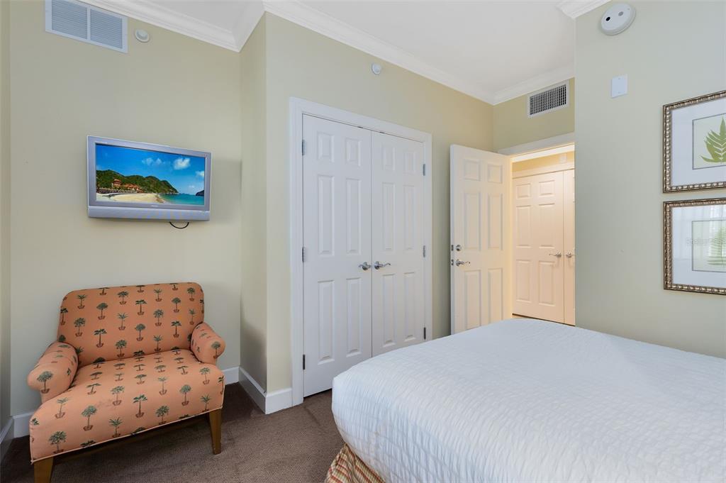 1360 Centre Ct Ridge Drive, Unit 201 Reunion, FL 34747 - Photo 7 of 29 a bedroom with a bed and a couch