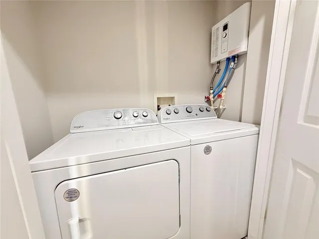 a bathroom with a shower and a shower