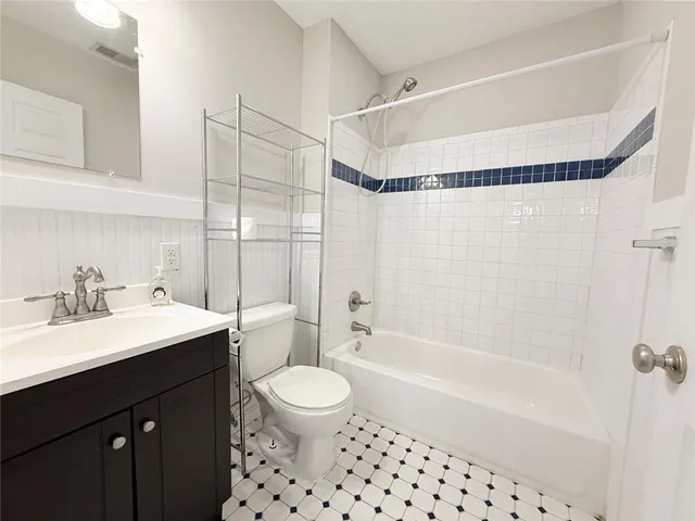 an empty room with a fireplace