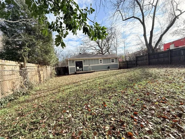 a view of a swimming pool with lounge chair